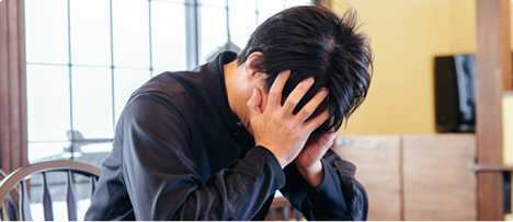 集客ができず頭を抱える様子